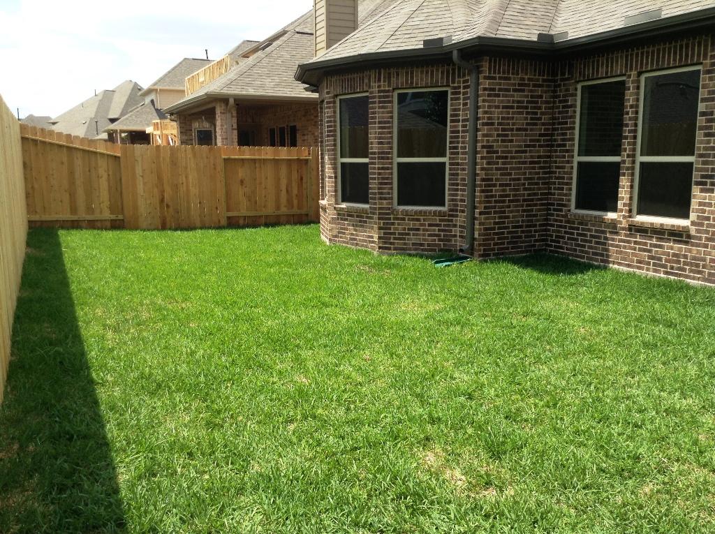 13117 Stoneleigh Terrace Drive Houston, TX 77077 - Photo 16 of 23 a view of front of a house with a yard