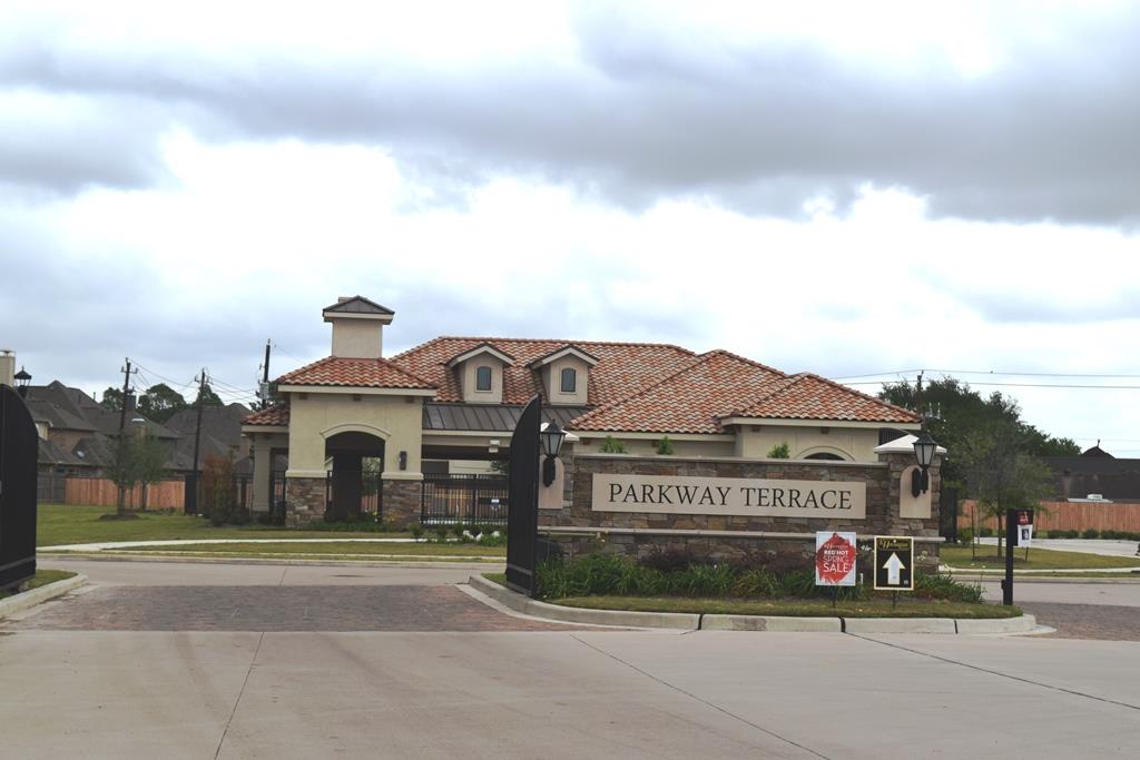 13117 Stoneleigh Terrace Drive Houston, TX 77077 - Photo 22 of 23 a view of a house with a yard and table and chairs
