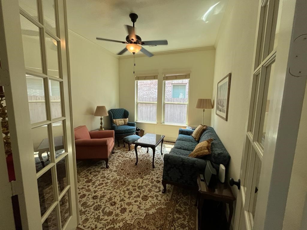 13117 Stoneleigh Terrace Drive Houston, TX 77077 - Photo 8 of 23 a living room with furniture and a window
