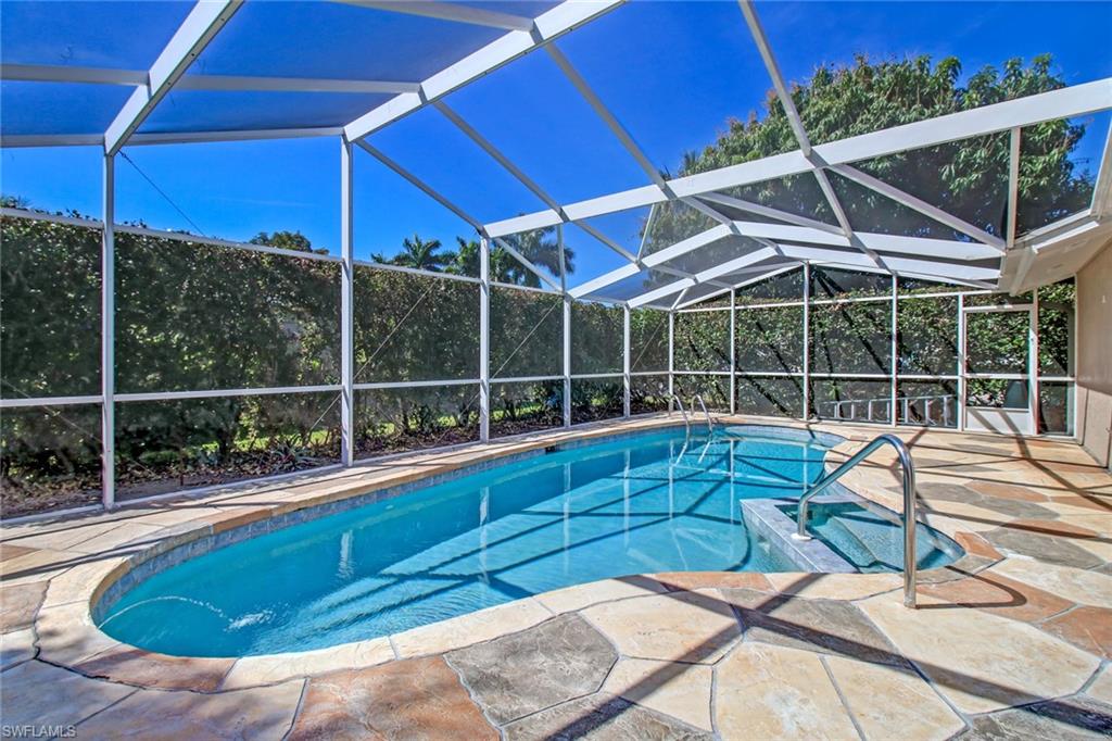 842 Roseate Drive Naples, FL 34104 - Photo 1 of 33 a view of a house with a backyard