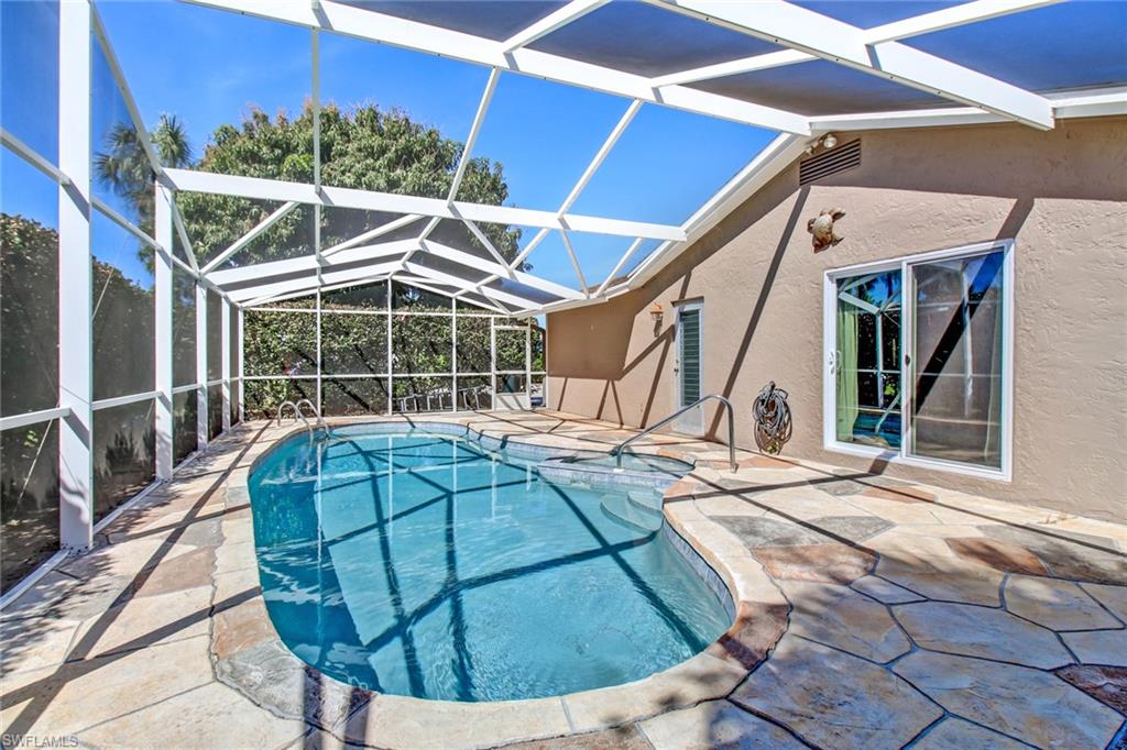 842 Roseate Drive Naples, FL 34104 - Photo 22 of 33 a view of a house with backyard