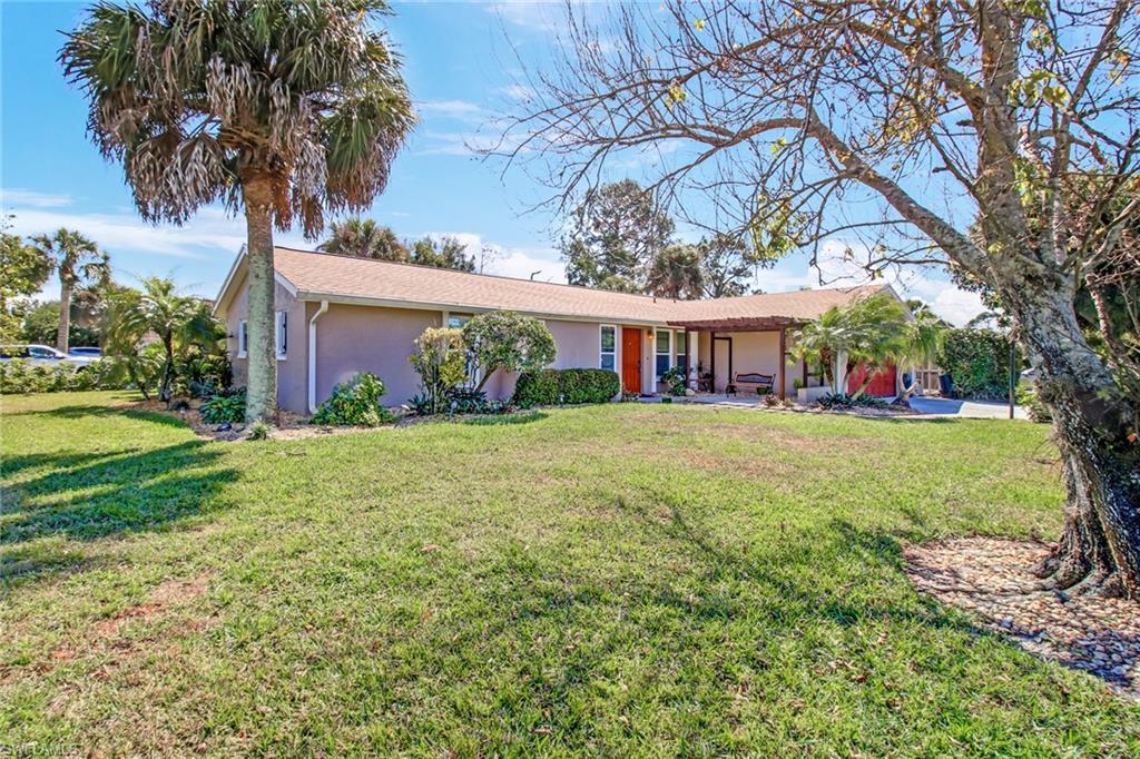 842 Roseate Drive Naples, FL 34104 - Photo 28 of 33 a view of house with yard and green space