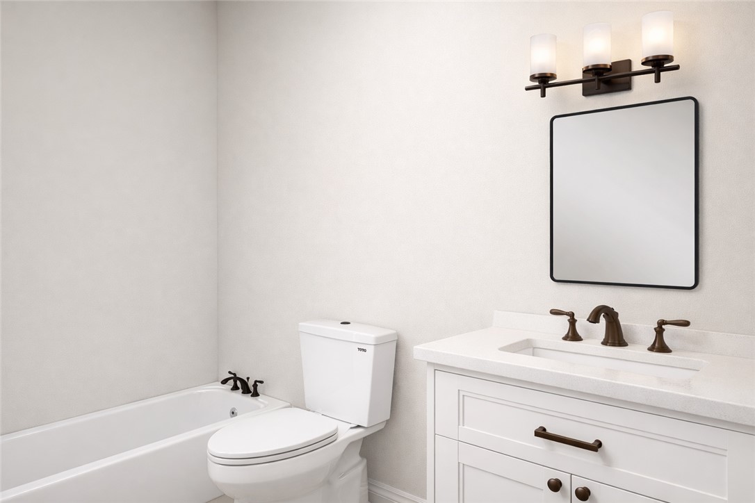 2576 Shady Rte Lane Bryan, TX 77803 - Photo 13 of 18 a bathroom with a sink toilet and a mirror