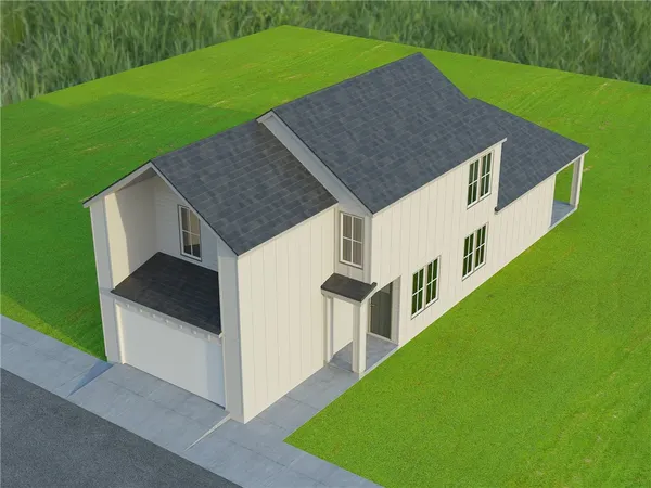 a aerial view of a house next to a yard with big yard