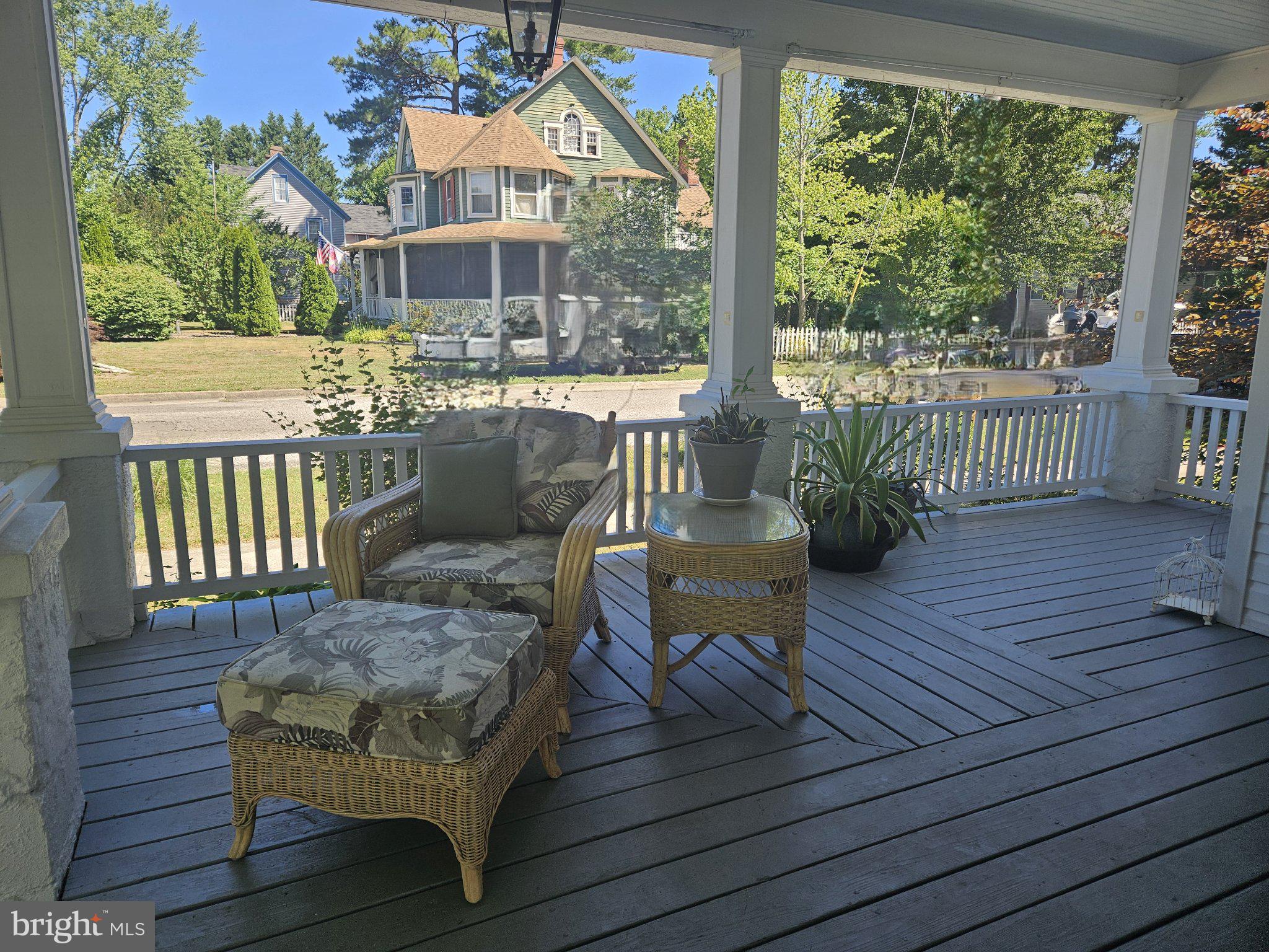 202 Central Avenue Ridgely, MD 21660 - Photo 5 of 22 Charming porch with serene views.