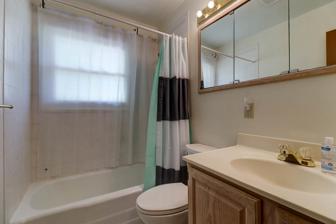 29 Pine Circle Tuscola, IL 61953 - Photo 14 of 27 a bathroom with a sink a toilet and shower