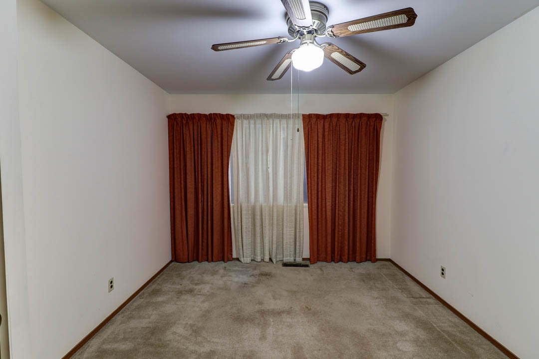 29 Pine Circle Tuscola, IL 61953 - Photo 19 of 27 an empty room with closet and fan