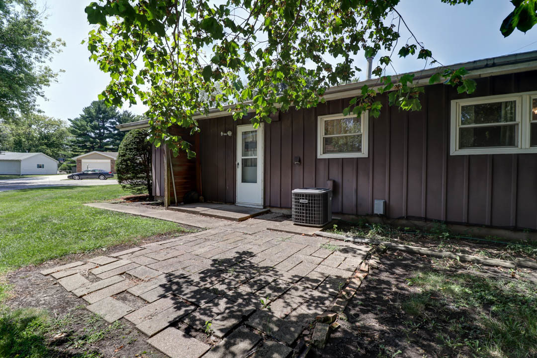 29 Pine Circle Tuscola, IL 61953 - Photo 2 of 27 a backyard of a house with lots of green space