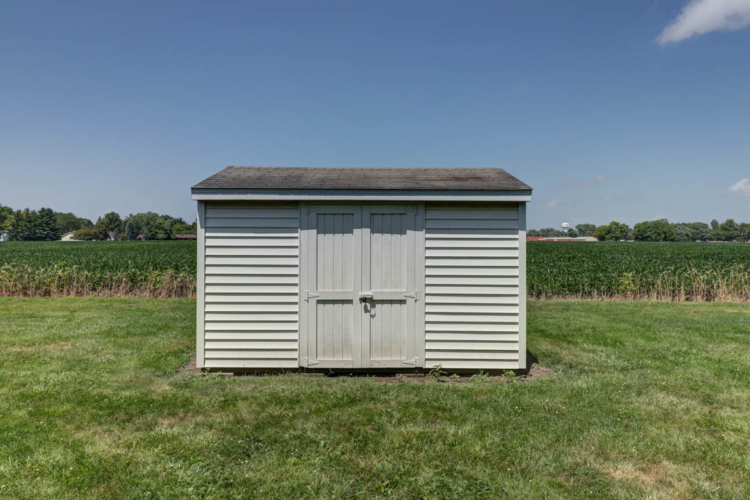 29 Pine Circle Tuscola, IL 61953 - Photo 4 of 27 a front view of a house with a yard