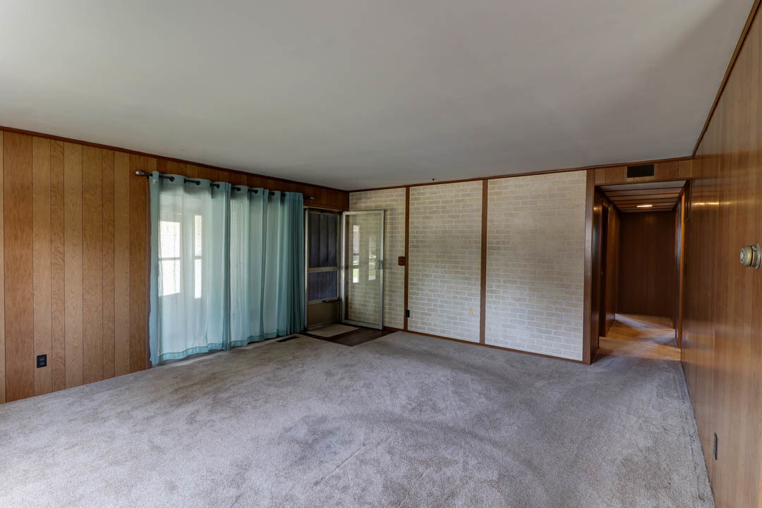 29 Pine Circle Tuscola, IL 61953 - Photo 9 of 27 a view of an empty room with a fireplace