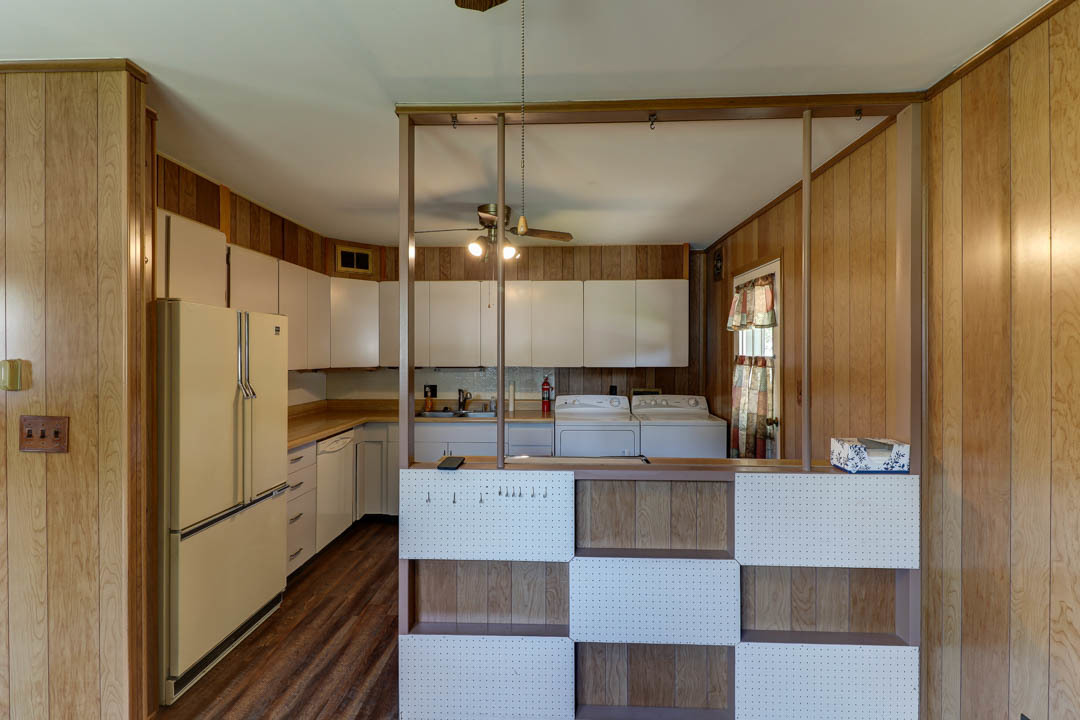29 Pine Circle Tuscola, IL 61953 - Photo 10 of 27 a kitchen with stainless steel appliances kitchen island granite countertop a refrigerator and a stove top oven