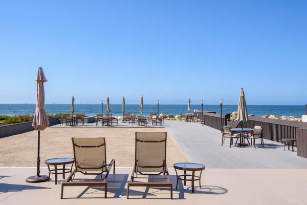 a view of a terrace with seating space