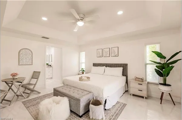 a bedroom with a bed and furniture