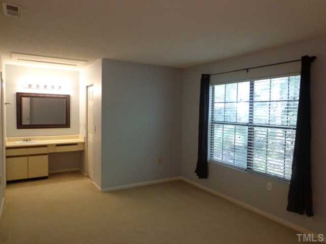 7735 Falcon Rest Circle Raleigh, NC 27615 - Photo 8 of 9 a room with window