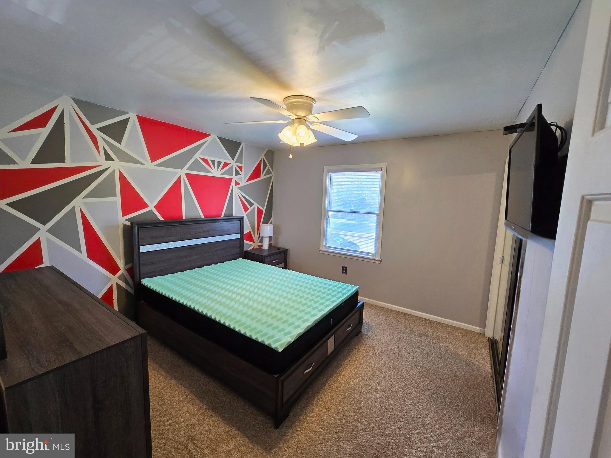 100 Constitution Avenue Reading, PA 19606 - Photo 17 of 35 a room with stairs and a chandelier