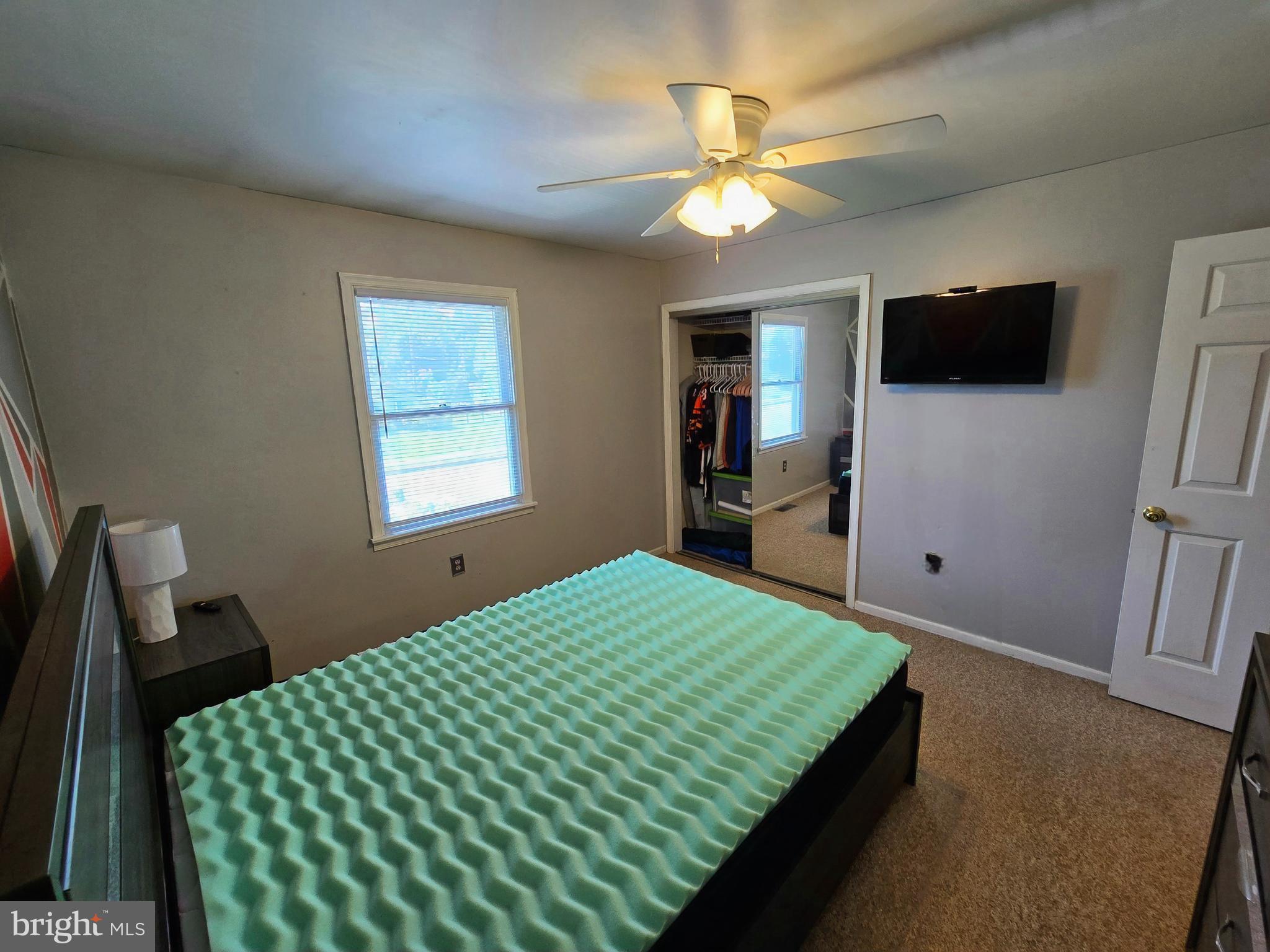 100 Constitution Avenue Reading, PA 19606 - Photo 18 of 35 a bedroom with a bed and a chandelier