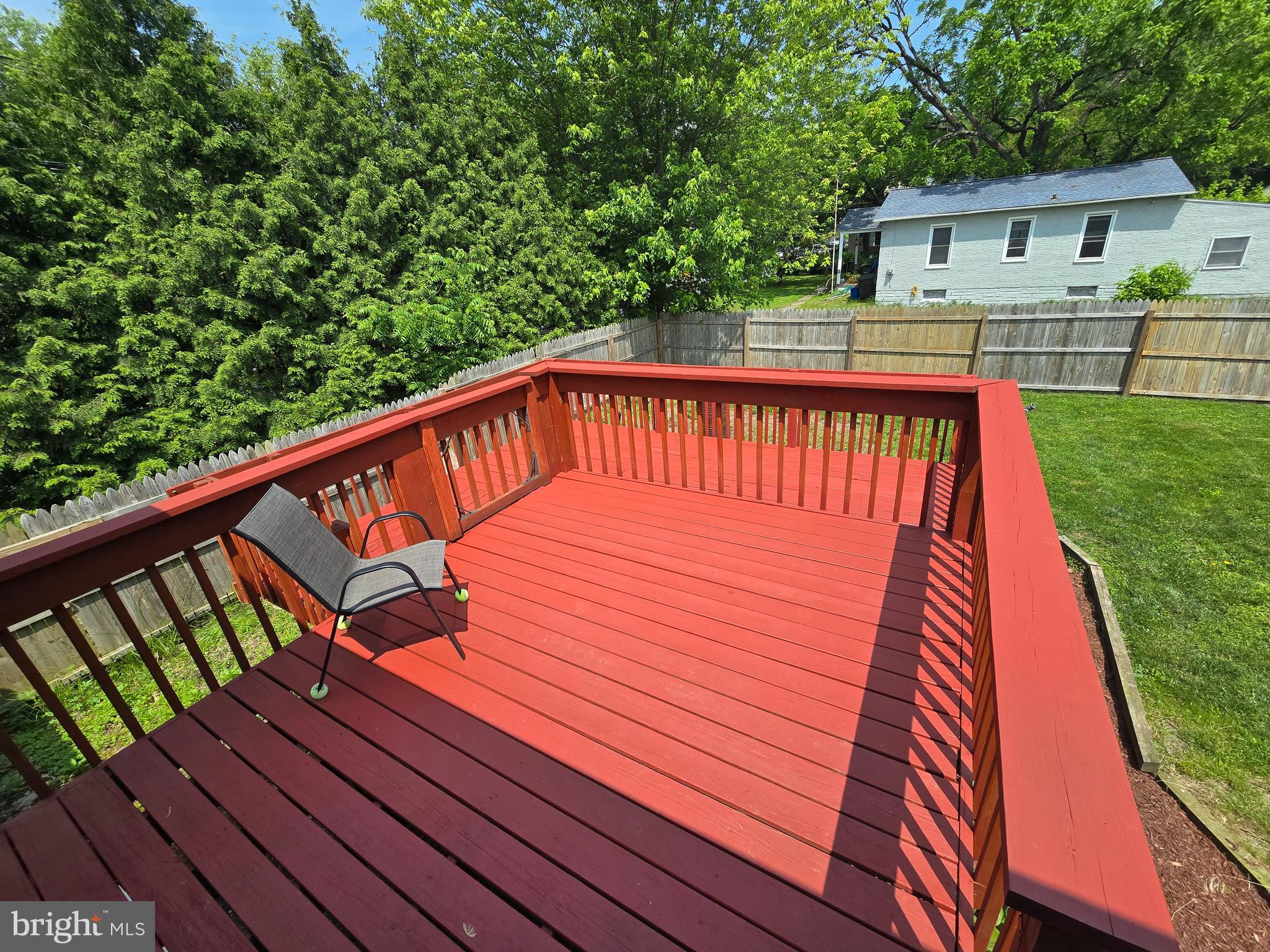 100 Constitution Avenue Reading, PA 19606 - Photo 25 of 35 a view of a wooden deck with a yard