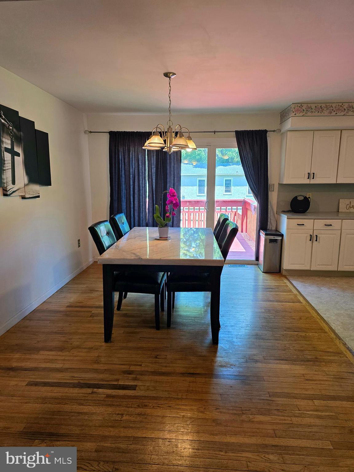 100 Constitution Avenue Reading, PA 19606 - Photo 6 of 35 a living room with furniture a dining table and a fireplace