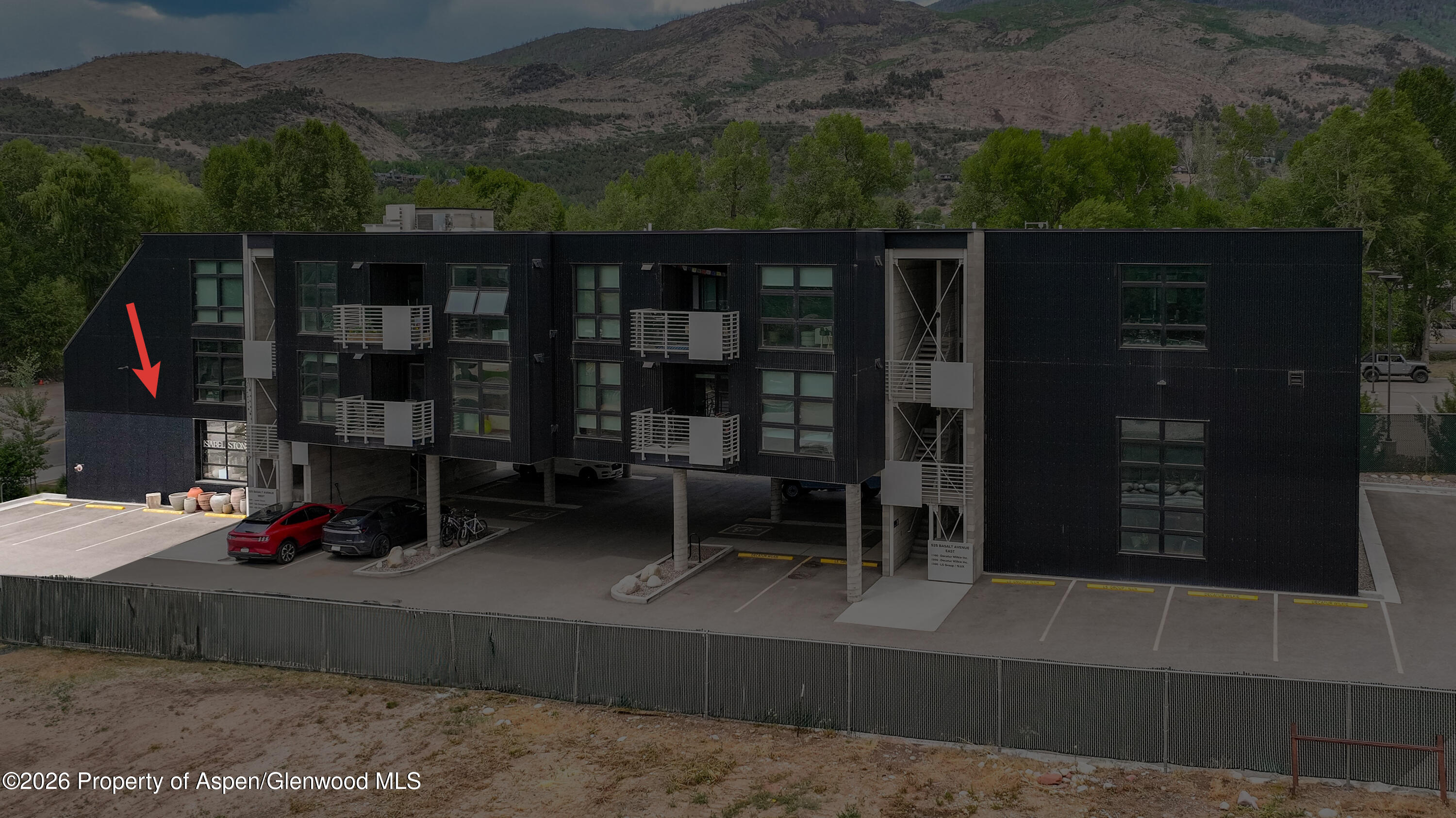 a view of a chairs in front of building