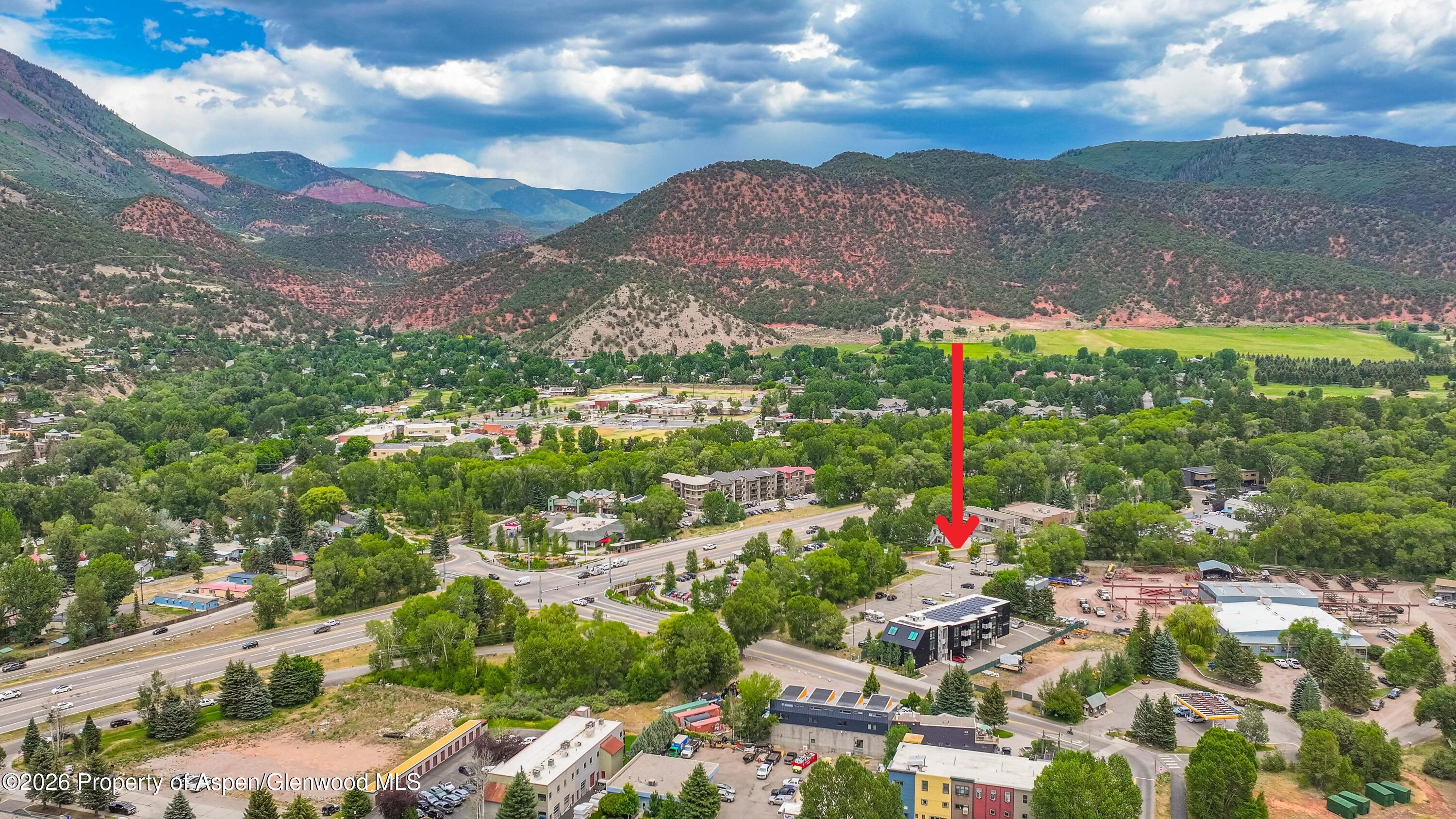 525 Basalt Avenue, Unit 101 Basalt, CO 81621 - Photo 3 of 3 a view of a houses with a yard