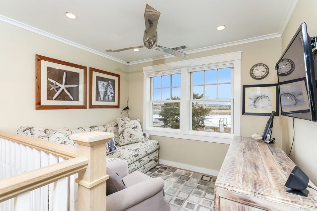 40 Dexter Road Marion, MA 02738 - Photo 13 of 27 a living room with furniture and a large window