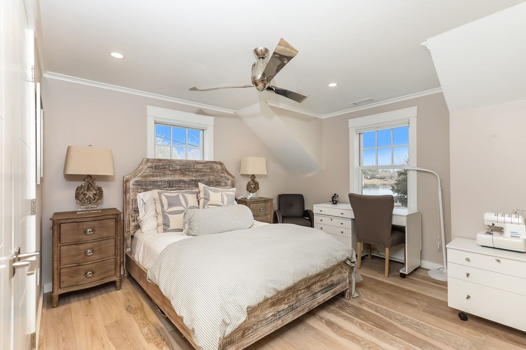 40 Dexter Road Marion, MA 02738 - Photo 19 of 27 a bedroom with a bed and a view of kitchen