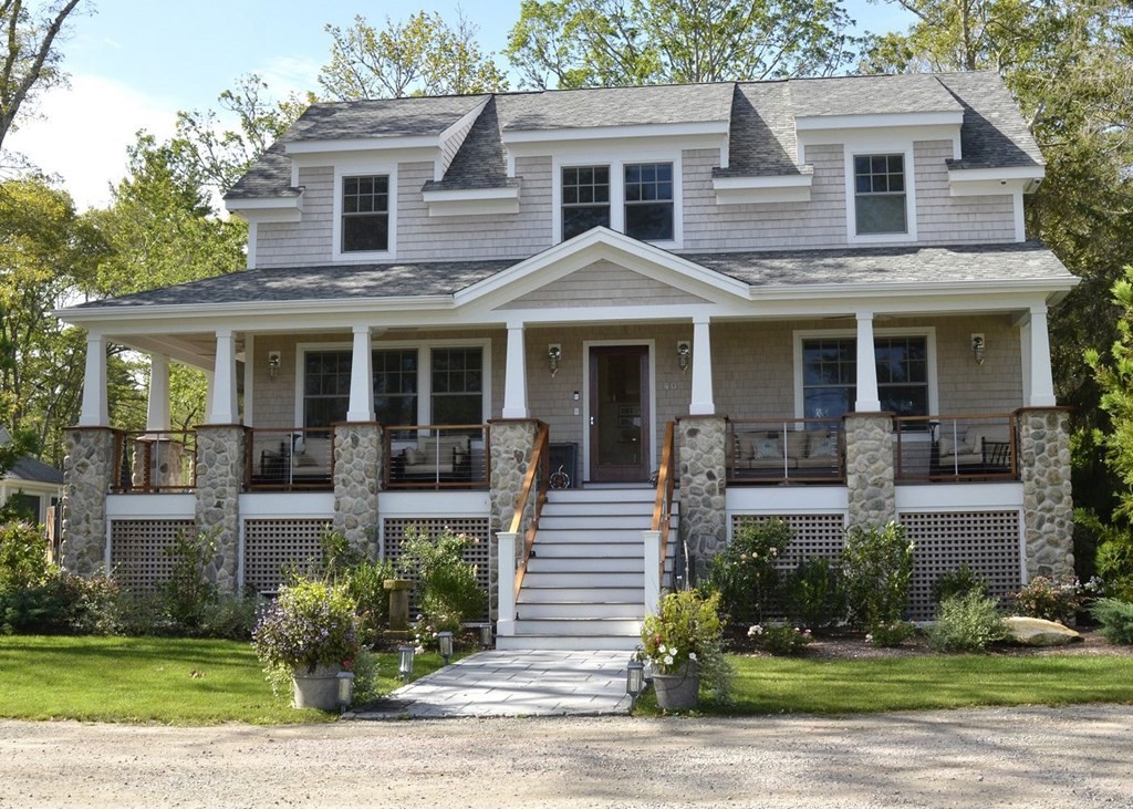 40 Dexter Road Marion, MA 02738 - Photo 2 of 27 a front view of a house with a yard and plants