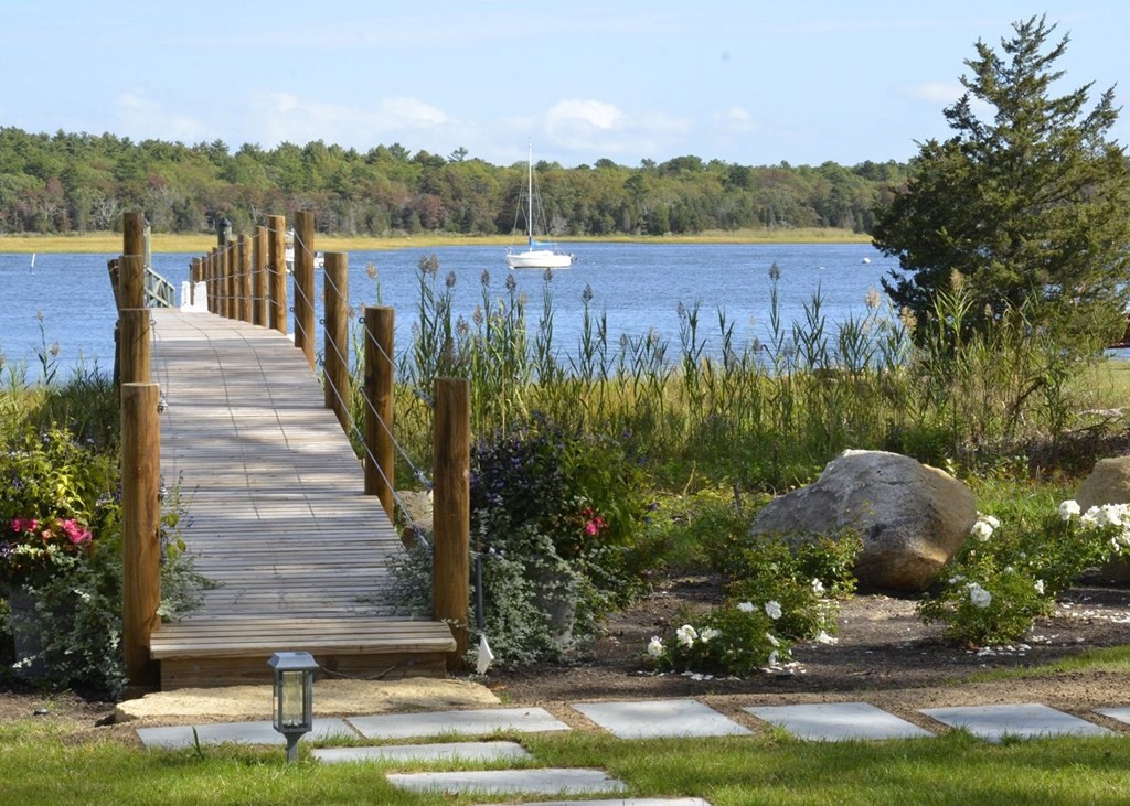 40 Dexter Road Marion, MA 02738 - Photo 3 of 27 a view of a garden with wooden stairs