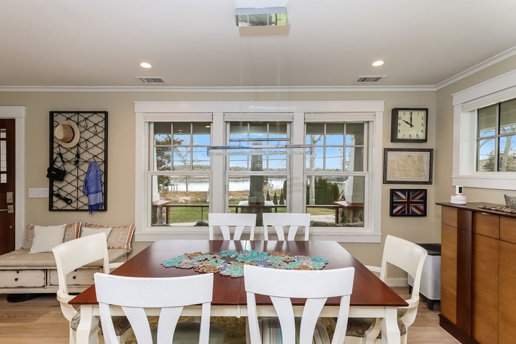 40 Dexter Road Marion, MA 02738 - Photo 6 of 27 a view of a dining room with furniture and wooden floor