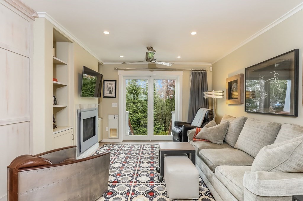 40 Dexter Road Marion, MA 02738 - Photo 9 of 27 a living room with furniture large window and flat screen tv