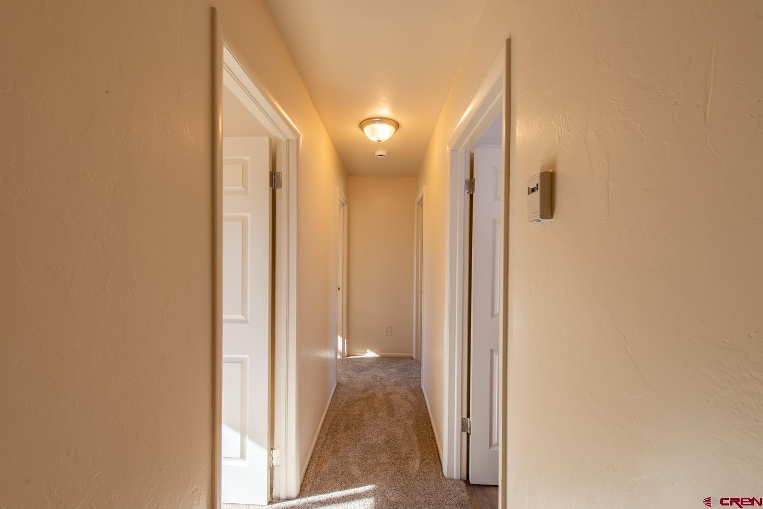 525 Elizabeth Street Delta, CO 81416 - Photo 15 of 30 a view of a bathroom with a sink and shower