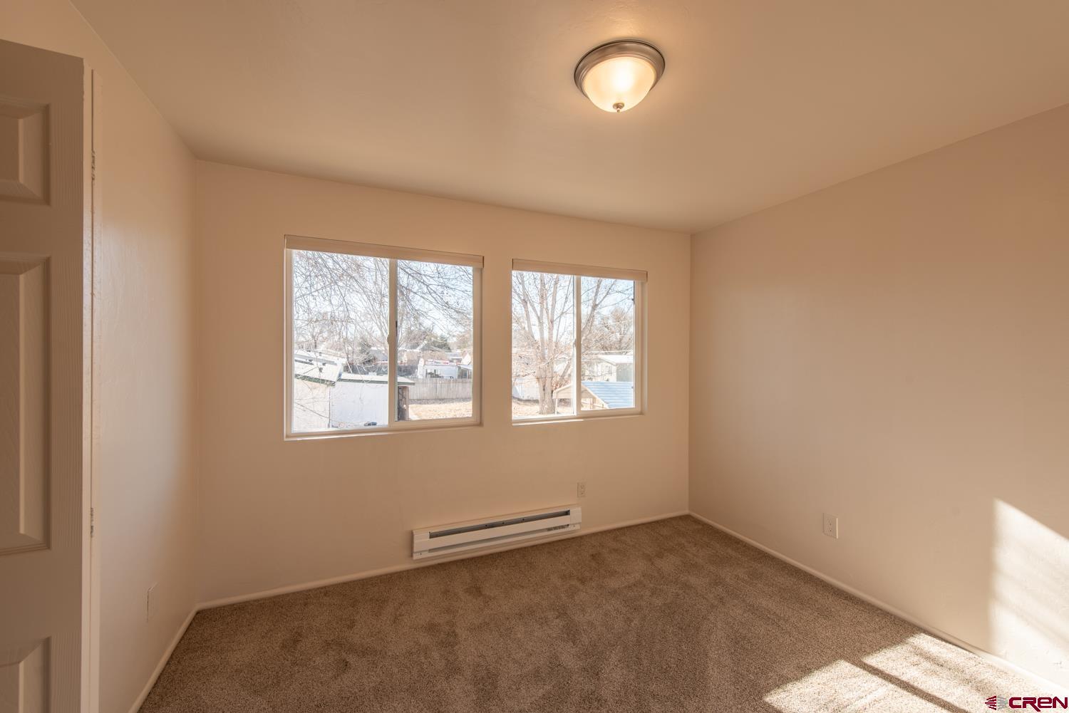 525 Elizabeth Street Delta, CO 81416 - Photo 16 of 30 an empty room with a window