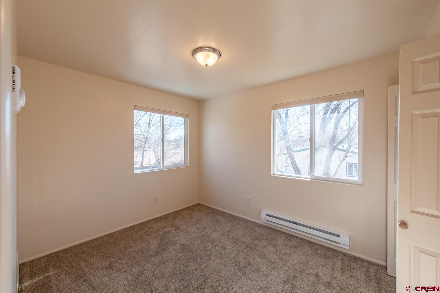 525 Elizabeth Street Delta, CO 81416 - Photo 24 of 30 an empty room with windows