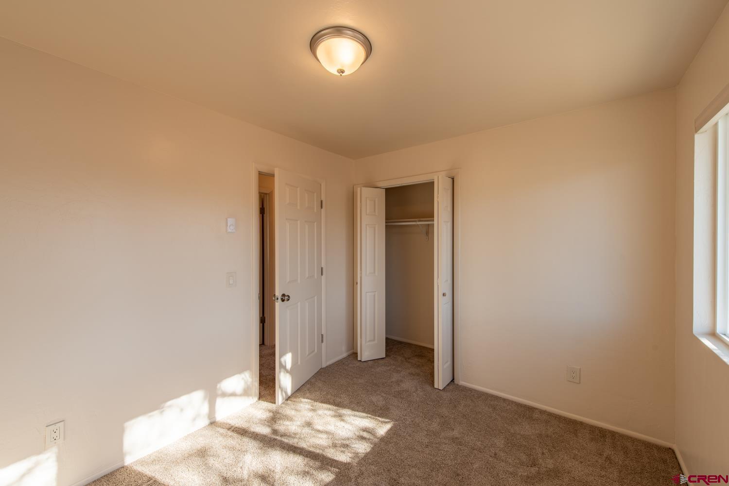 525 Elizabeth Street Delta, CO 81416 - Photo 26 of 30 a view of livingroom with window