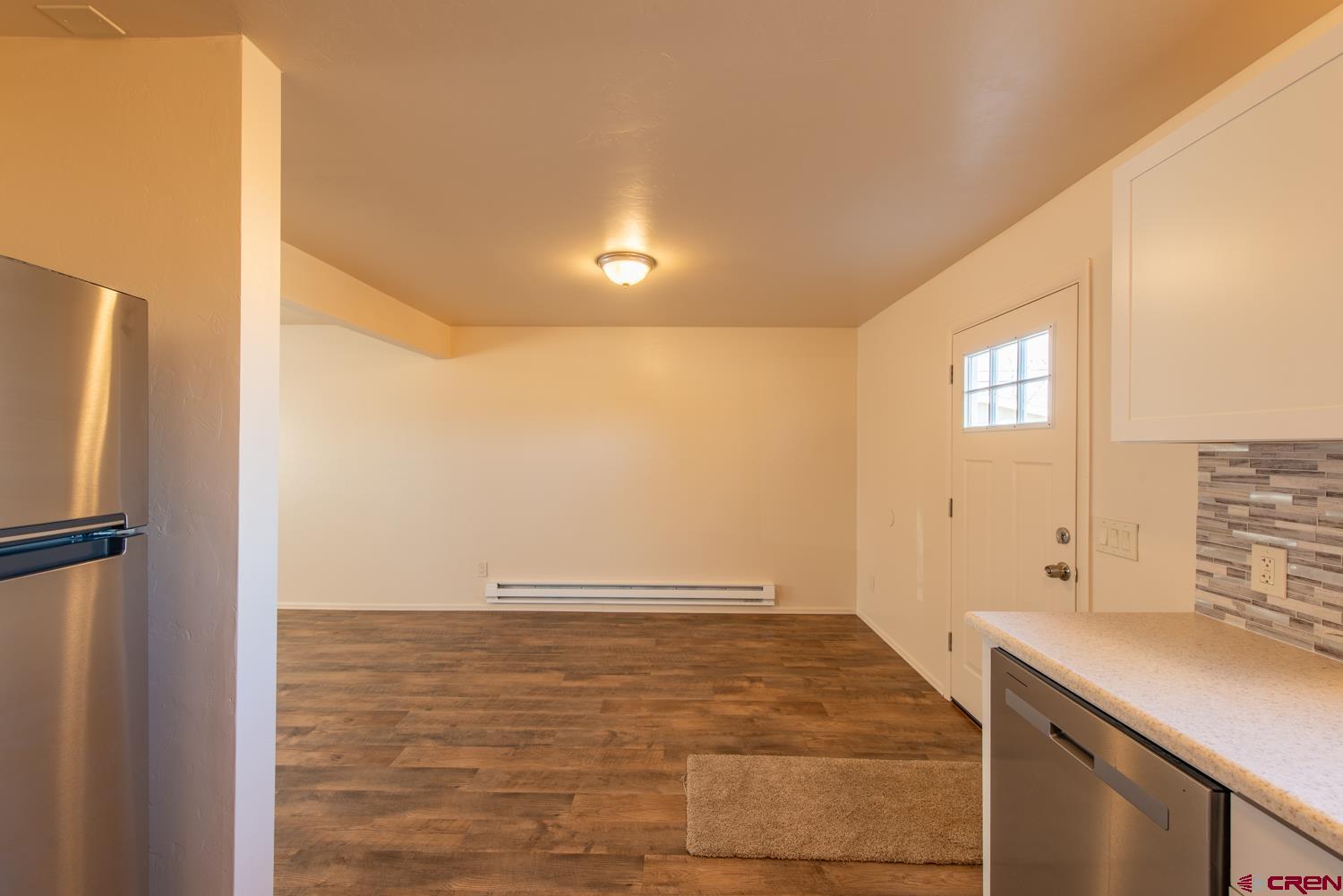 525 Elizabeth Street Delta, CO 81416 - Photo 3 of 30 a view of kitchen with wooden floor