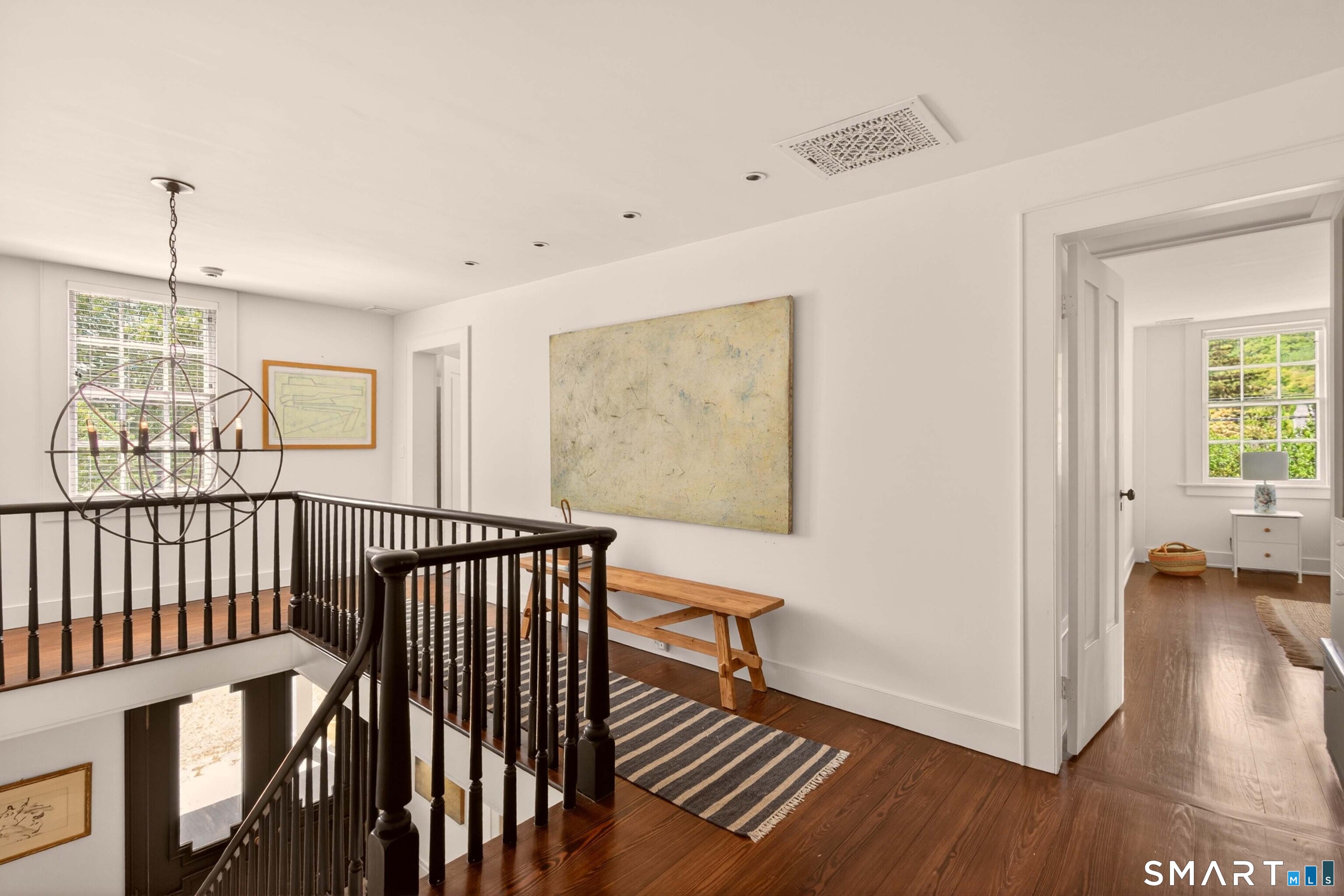 100 North Main Street Kent, CT 06757 - Photo 23 of 40 a view of a hallway with wooden floor and stairs