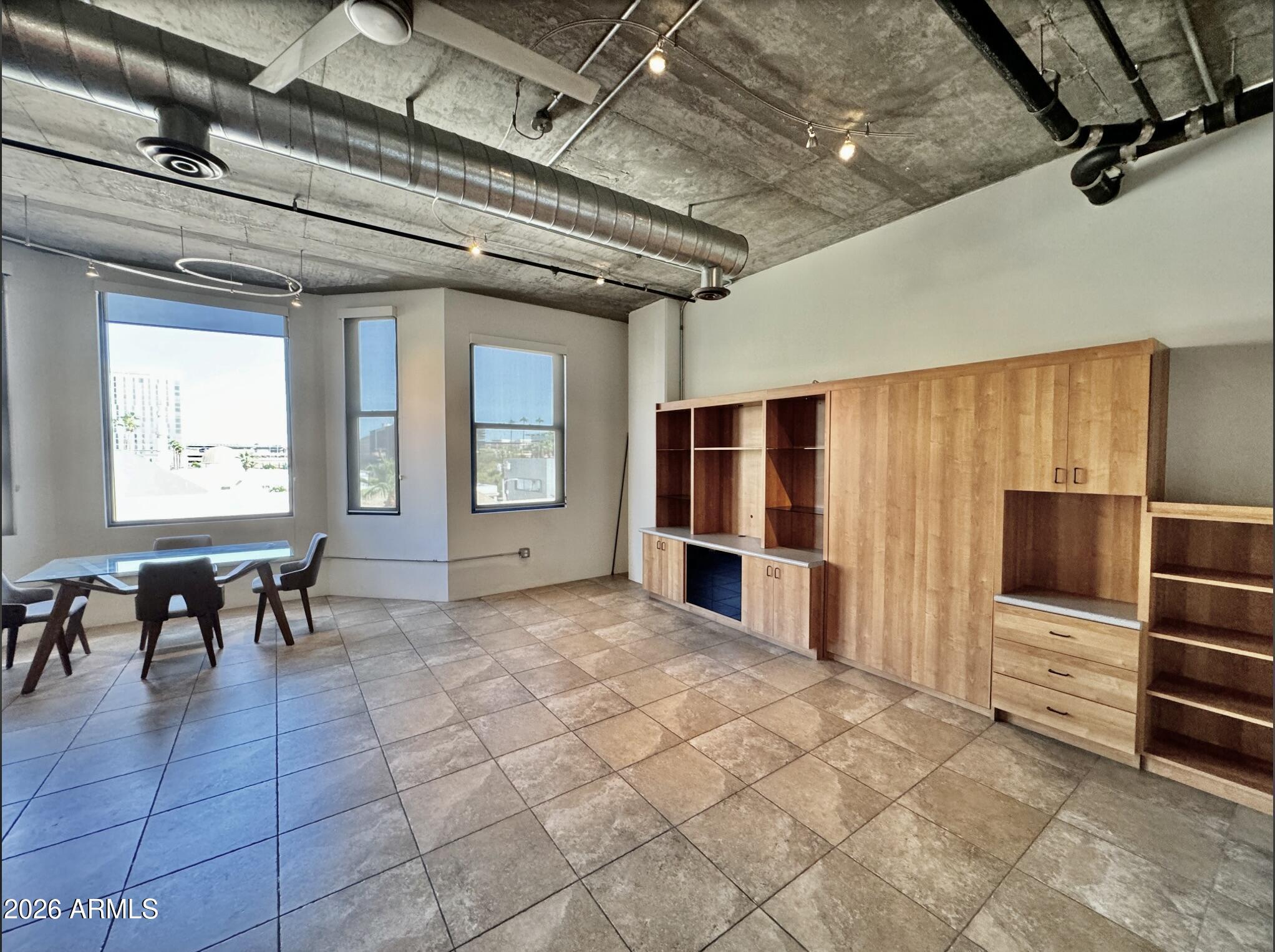 21 East 6th Street, Unit 306 Tempe, AZ 85281 - Photo 16 of 31 a view of kitchen with furniture and window