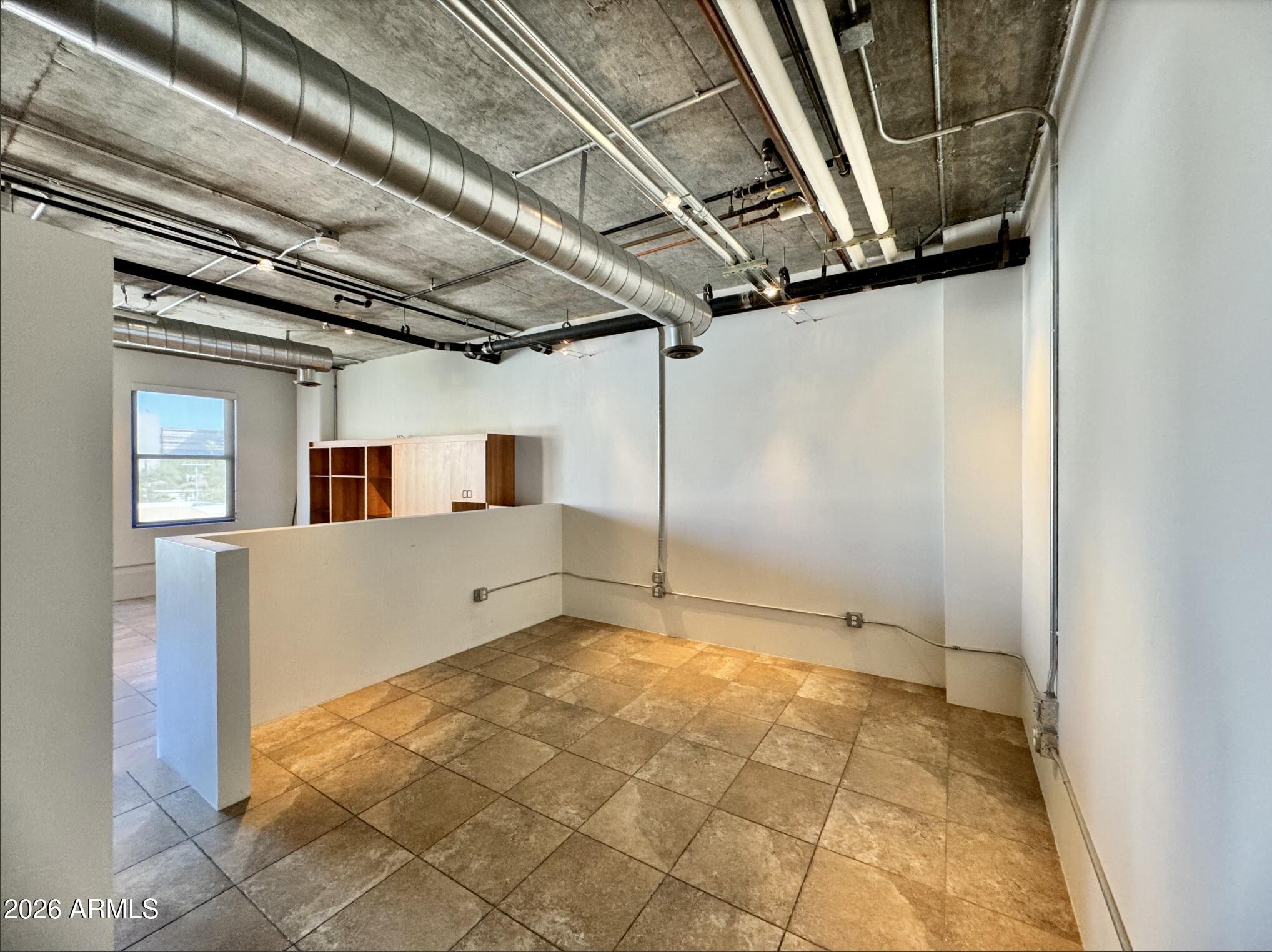 21 East 6th Street, Unit 306 Tempe, AZ 85281 - Photo 20 of 31 a view of a garage