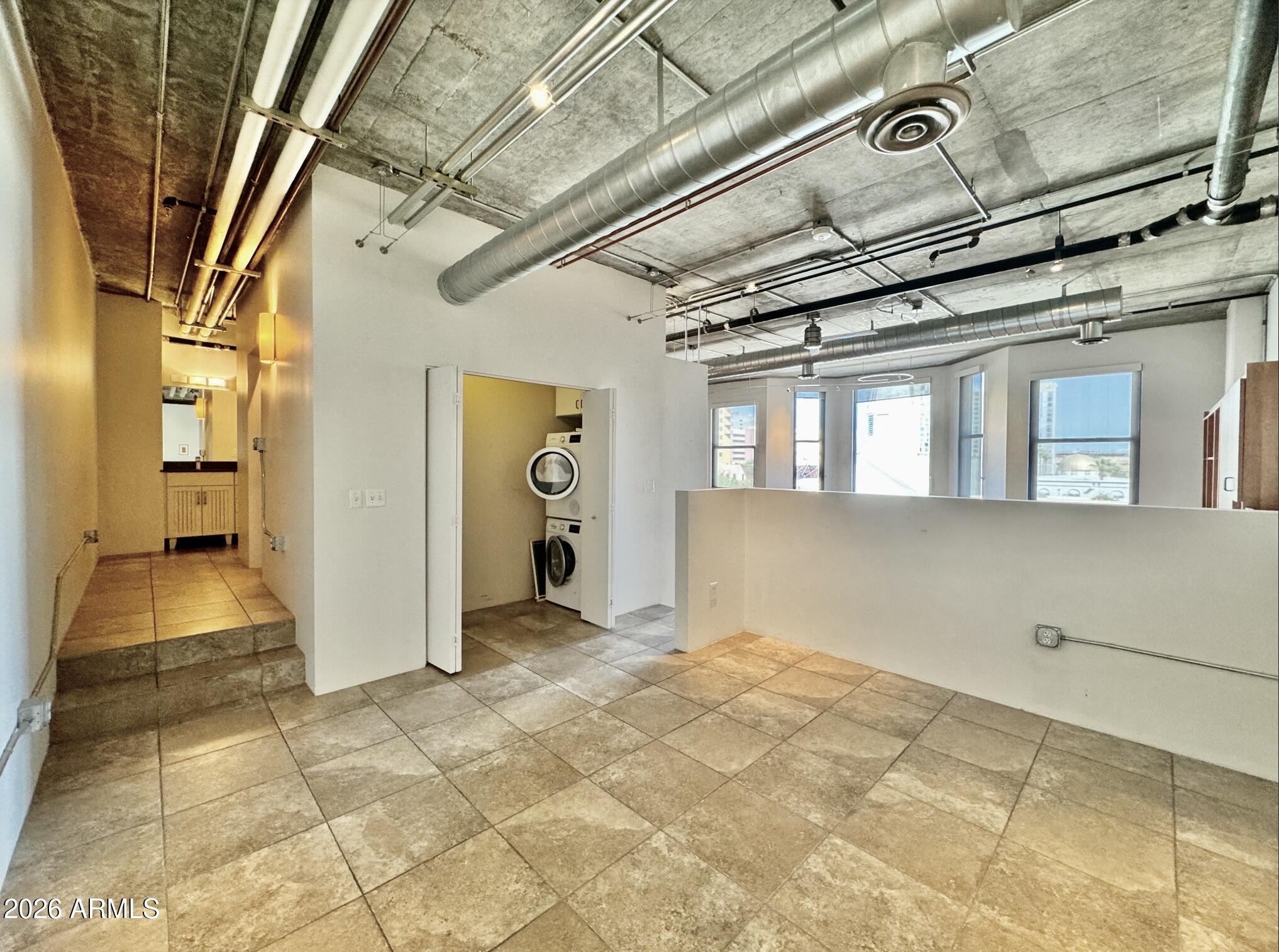 21 East 6th Street, Unit 306 Tempe, AZ 85281 - Photo 21 of 31 a view of a hallway with a white walls