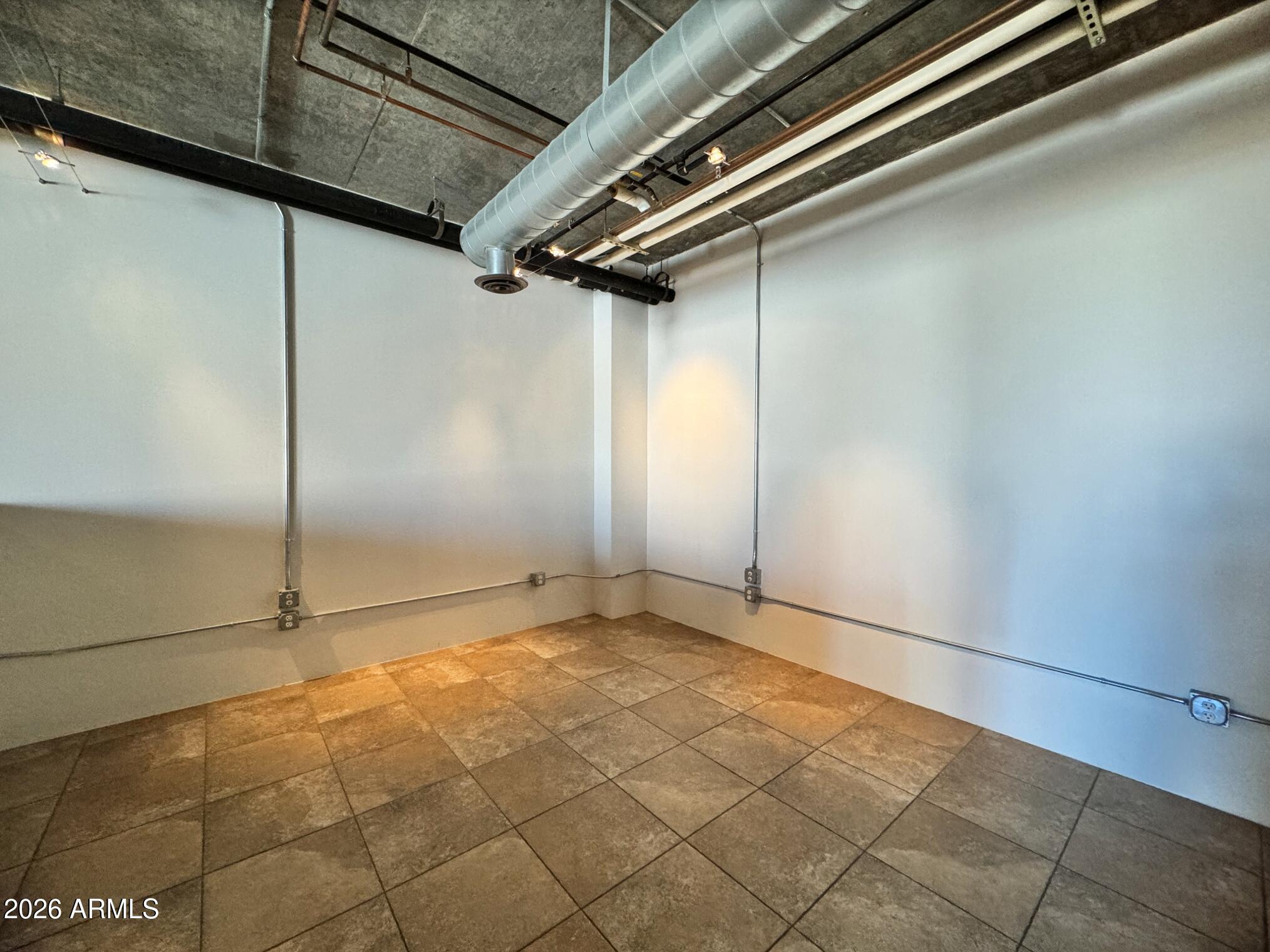 21 East 6th Street, Unit 306 Tempe, AZ 85281 - Photo 23 of 31 a view of an empty room