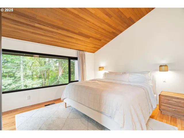 a bathroom with a sink double vanity and a mirror