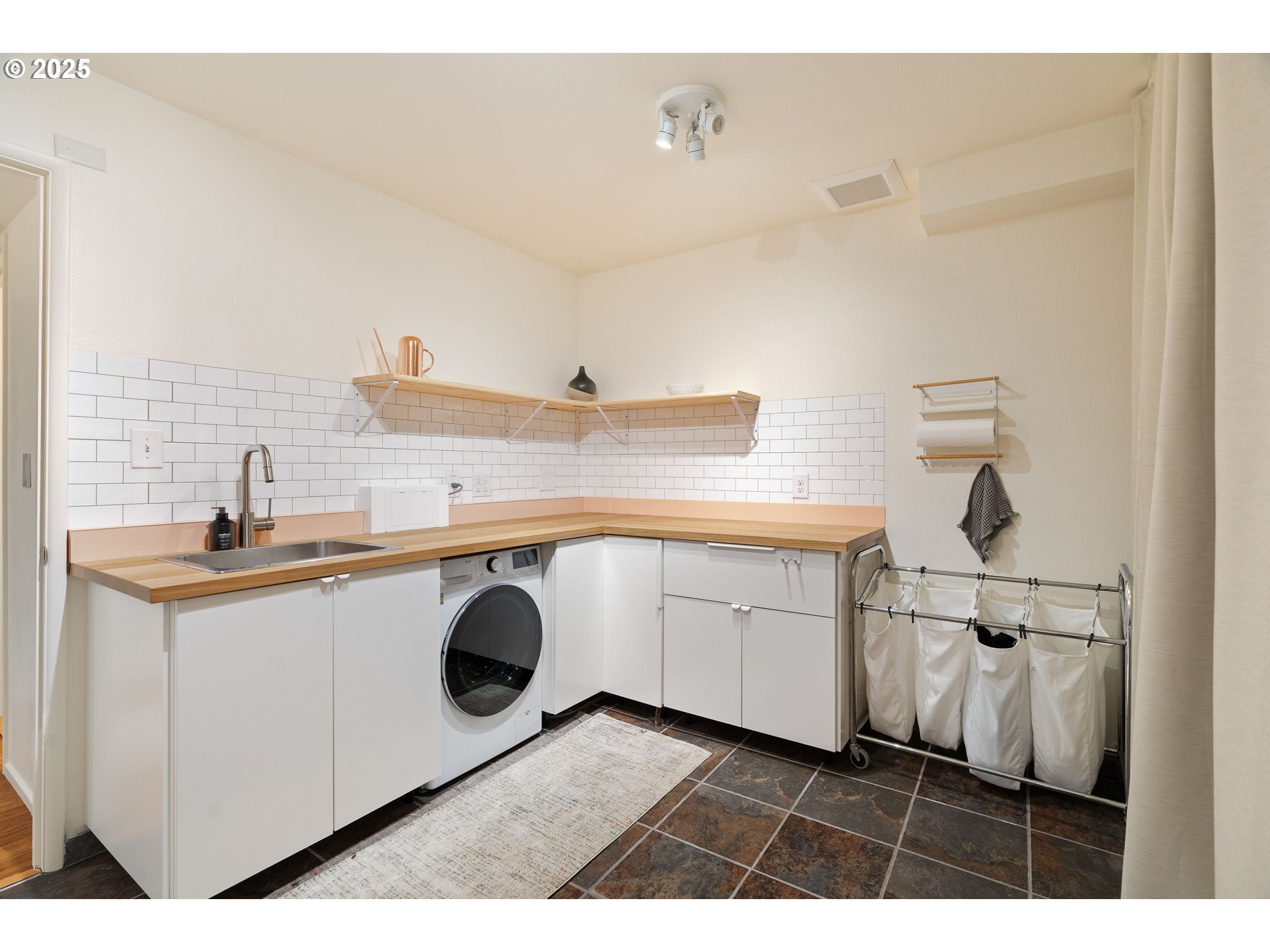 1555 Southwest Miller Court Gresham, OR 97080 - Photo 34 of 47 a utility room with sink dryer and washer