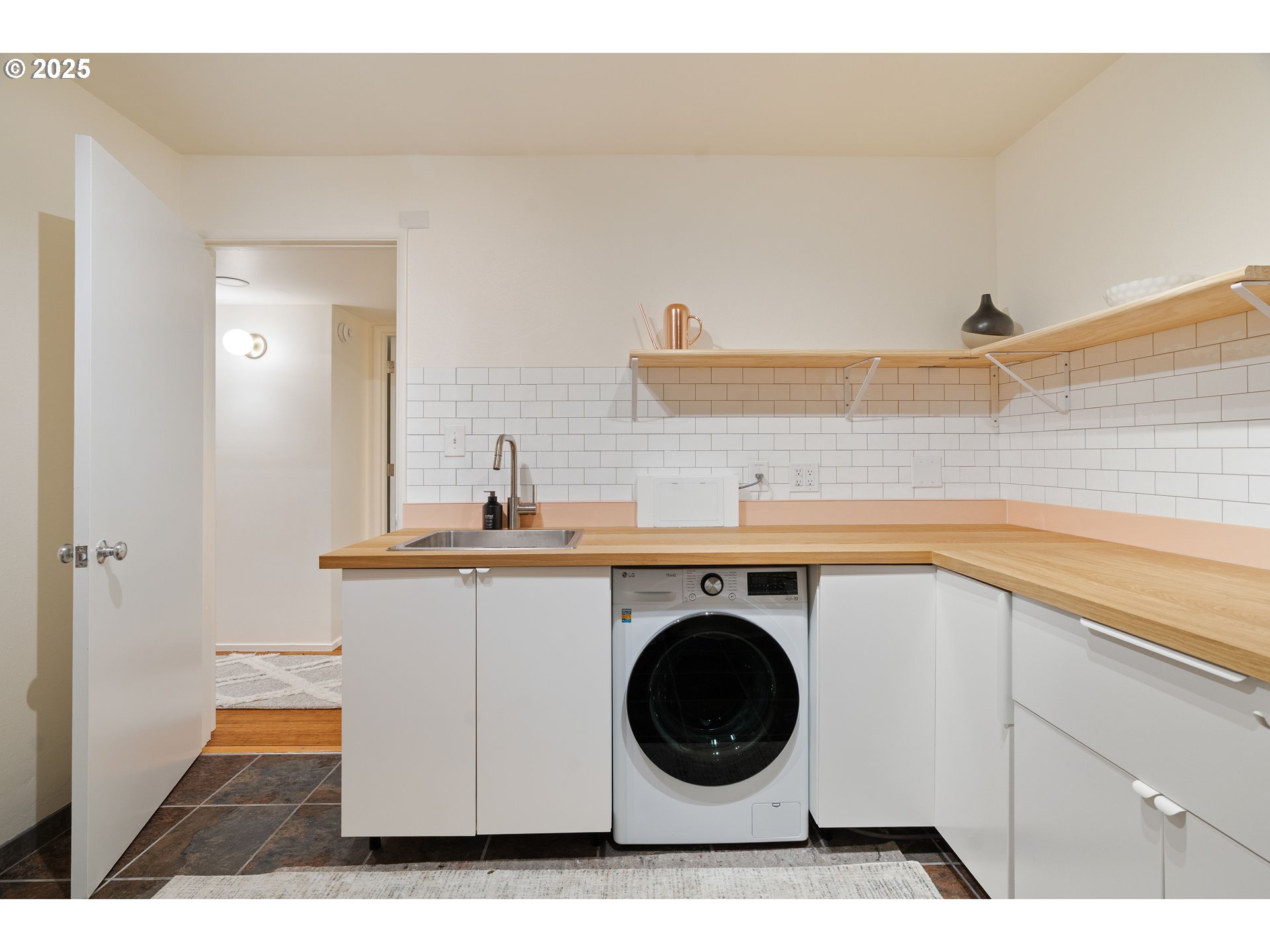1555 Southwest Miller Court Gresham, OR 97080 - Photo 35 of 47 a utility room with sink dryer and washer