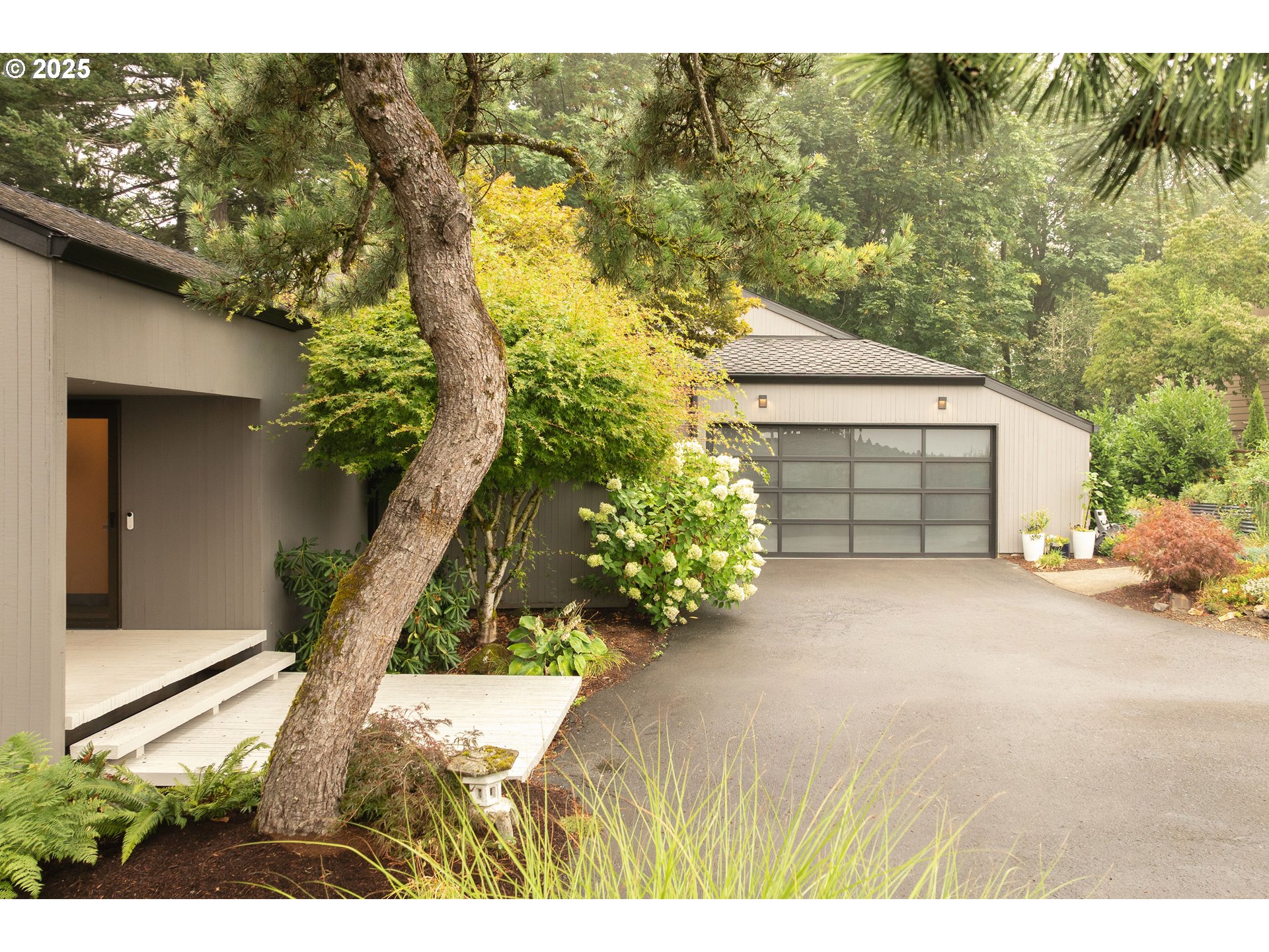 1555 Southwest Miller Court Gresham, OR 97080 - Photo 44 of 47 a view of a house with a park