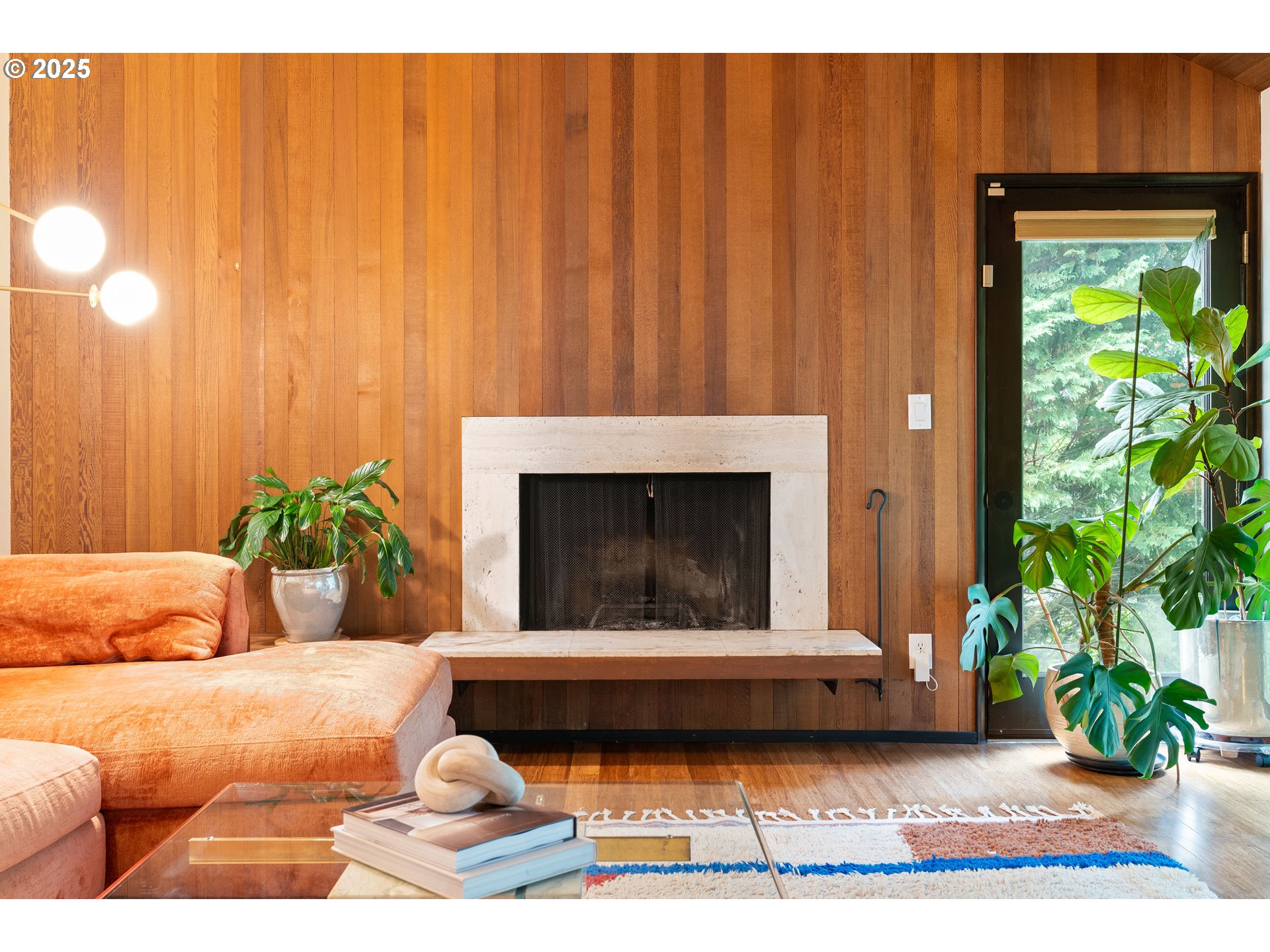 1555 Southwest Miller Court Gresham, OR 97080 - Photo 6 of 47 a living room with a couch and a potted plant