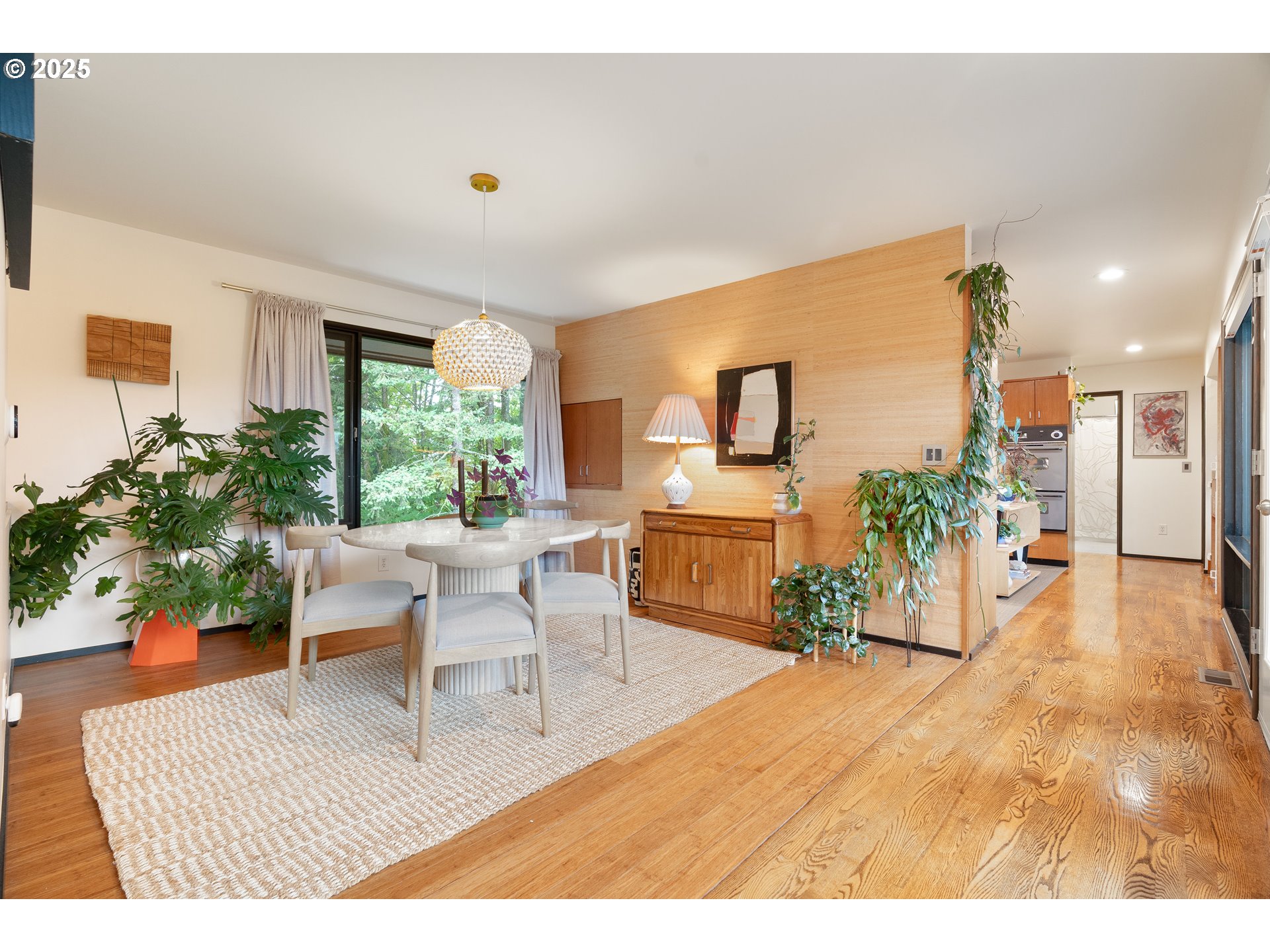 1555 Southwest Miller Court Gresham, OR 97080 - Photo 10 of 47 a living room with furniture and a large window