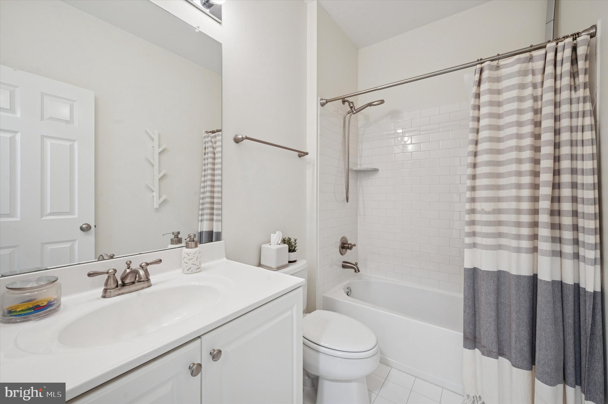 610 Captains Way Philadelphia, PA 19146 - Photo 17 of 25 a bathroom with a sink toilet tub and shower
