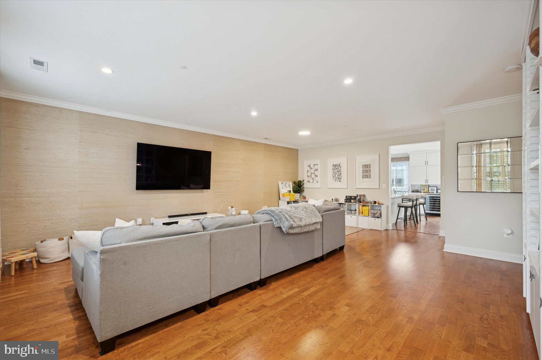 610 Captains Way Philadelphia, PA 19146 - Photo 2 of 25 a living room with furniture and a flat screen tv
