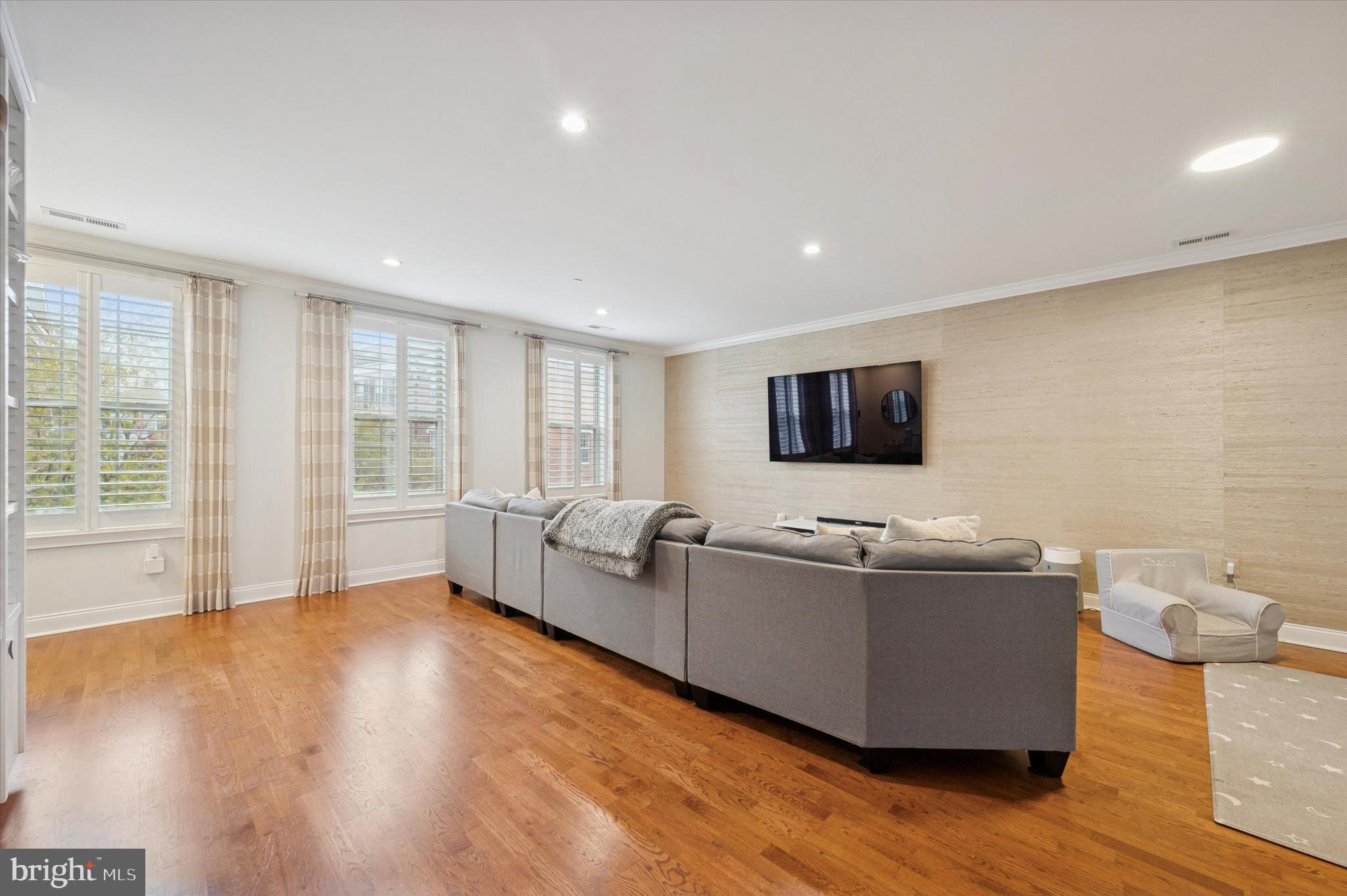 610 Captains Way Philadelphia, PA 19146 - Photo 3 of 25 a living room with furniture and a flat screen tv