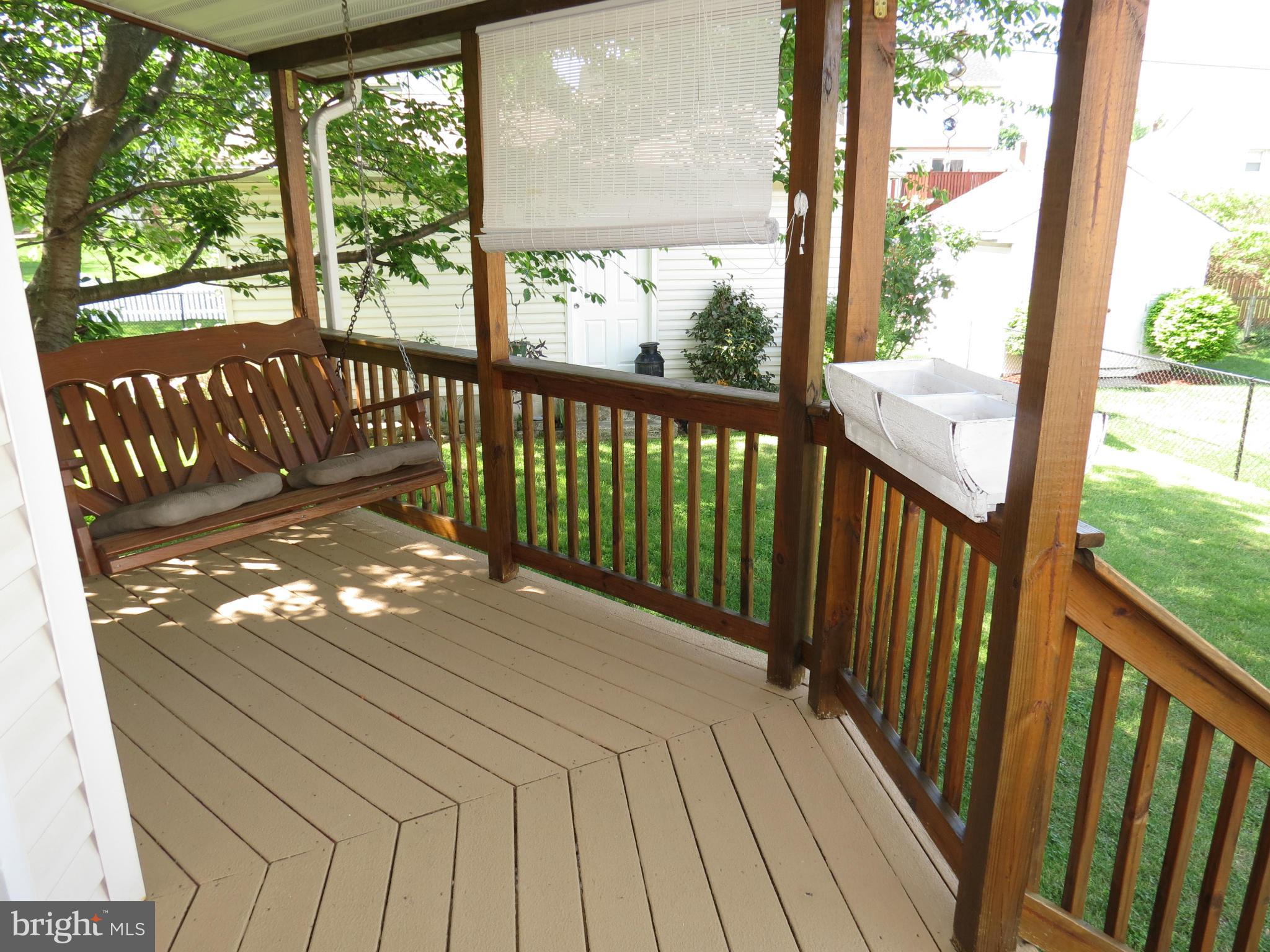 549 Forest View Road Linthicum Heights, MD 21090 - Photo 23 of 30 a view of a balcony with wooden floor